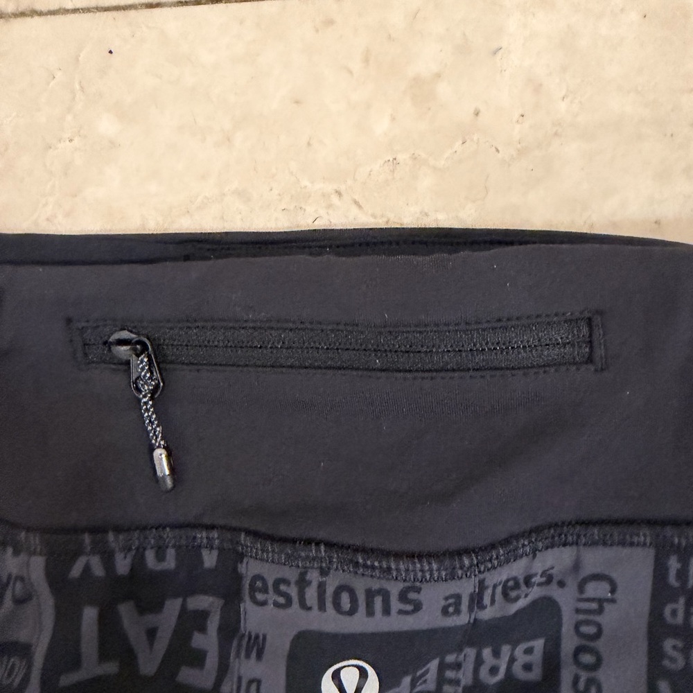 💜Rare NWOT Lululemon Manifesto Black Text Print Mini Skirt - Picture 8 of 11